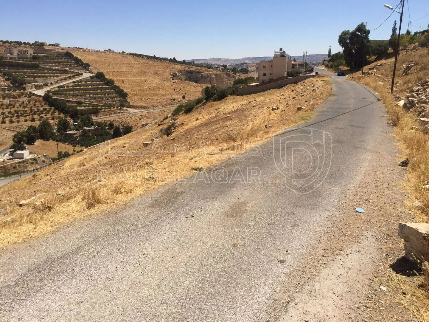أرض في طريق السرو مثلث اليزيديه ‎ثاني دخله عالشمال - 100,000 دأ - صورة 1